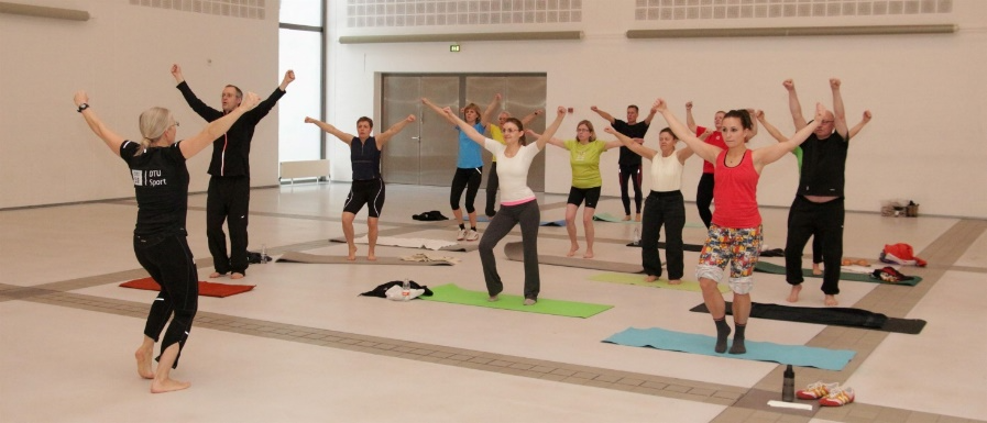 A group of people jumping in the air Description automatically generated